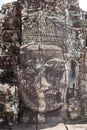 Ruin bayon stone face at gateway of Angkor Wat, Siem Reap, Cambodia. Royalty Free Stock Photo