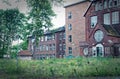 Ruin of a large brick house after a fire in the attic to clarify fire damage Arson theft and vandalism Royalty Free Stock Photo