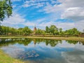 Ruin of Pagoda in Wat mahathat Temple Area and reflection in the water At sukhothai historical park Royalty Free Stock Photo