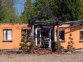 Ruin and remains of a burned down house