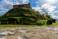 Ruin of Torres Vedras Castle on top of green hill, with path beside, Portugal Royalty Free Stock Photo