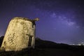 Ruin windmill in the night sky. Royalty Free Stock Photo