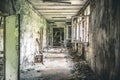 Ruined class room with desks and blackboards in Pripyat school Royalty Free Stock Photo