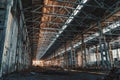 Ruined and abandoned industrial factory warehouse hangar with perspective view Royalty Free Stock Photo