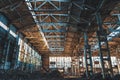 Ruined and abandoned industrial factory warehouse hangar with perspective view Royalty Free Stock Photo