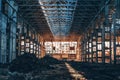Ruined and abandoned industrial factory warehouse hangar with perspective view Royalty Free Stock Photo