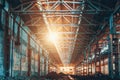 Ruined and abandoned industrial factory warehouse hangar in sunset light, Royalty Free Stock Photo