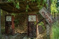 Ruined abandoned old gas station during summer in the lost forgotten village