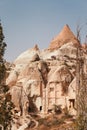 Ruined and ancient cave house in Cappadocia mountain landscape Royalty Free Stock Photo