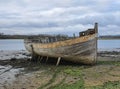 Ruined boat at the side of the river