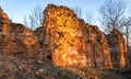 Ruined brick wall of a medieval castle, beautiful sunset colors in spring Royalty Free Stock Photo