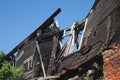 Ruined building after a fire. Wall of a wooden burnt house Royalty Free Stock Photo