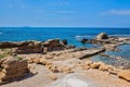 The ruined castle walls in Mediterranean sea Royalty Free Stock Photo