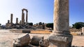 Ruined columns. Temple in the middle of Amman. Pillar in front. Roman civilization. Historic park in the middle of Amman.