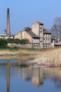 Ruined factory on lake Royalty Free Stock Photo