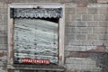 Ruined grungy bricks wall with an old window Royalty Free Stock Photo