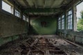 Ruined gymnasium in abandoned school