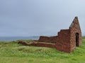 Ruined house building by the sea