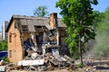 Ruined house damage after disaster. Demolition of old buildings.