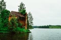 Ruined water mill near the lake. Summer landscape. Nature. Royalty Free Stock Photo