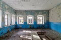 Ruined interior of an old abandoned rural school in Russia