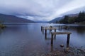 Ruined jetty at dawn, Loch Lomond, Scotland Royalty Free Stock Photo