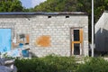 Ruined maldivian house with an orange door Maldives Royalty Free Stock Photo