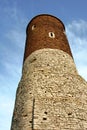 Ruined medieval castle with tower in Checiny