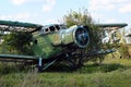 Ruined old Antonov An-2, a Soviet mass-produced single-engine biplane aircraft on an airplane cemetery Royalty Free Stock Photo