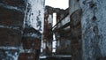 Ruined old building red brick walls in middle of frozen lake