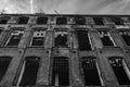 Ruined old textile factory in black and white, B&W. Royalty Free Stock Photo