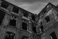 Ruined old textile factory in black and white, B&W. Royalty Free Stock Photo