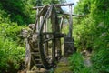 Ruined old Wheel Mill Building in the forest gorge Royalty Free Stock Photo