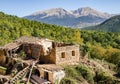 A ruined out leaning old abandoned house on mountain in Greece. Royalty Free Stock Photo