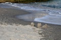 Ruined sand castles on beach coastline of Black sea shore Royalty Free Stock Photo