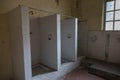 Ruined Showers In A Decadent Prison Room