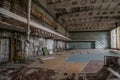 Ruined sport gym in the abandoned school building located in the Pripyat ghost town Royalty Free Stock Photo