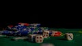 Ruined stacks of poker chips and dices on a green table in the casino Royalty Free Stock Photo