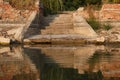 Ruined stairs leading to water