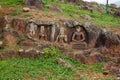 Ruined statue in heritage Buddhist excavated site Ratnagiri meaning hill of jewels