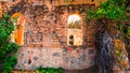 Ruined stone wall of an old roman Catholic church