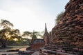 Ruined stupas in Ayutthaya Historical Park during sunset