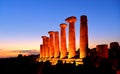 Ruined Temple of Heracles columns in famous ancient Valley of Temples on blue hour sunset in summer evening, Agrigento, Sicily, It