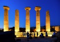 Ruined Temple of Heracles columns in famous ancient Valley of Temples on blue hour sunset in summer evening, Agrigento, Sicily, It