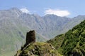 A ruined tower in the mountains