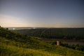 Ruined old castle tower at night on the river bank Royalty Free Stock Photo