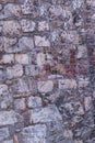 Ruined wall block red brown beige cement wall old fortress background texture stone broken Royalty Free Stock Photo