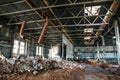 Ruins of abandoned factory or warehouse, large creepy and empty industrial constriction