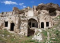 Ruins of an abandoned old cave houses with stairs at Avanos. Turkey, Cappadocia