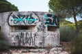 Ruins of an Abandoned and Vandalized Round Shelter with two Rectangular Windows in the South of Spain